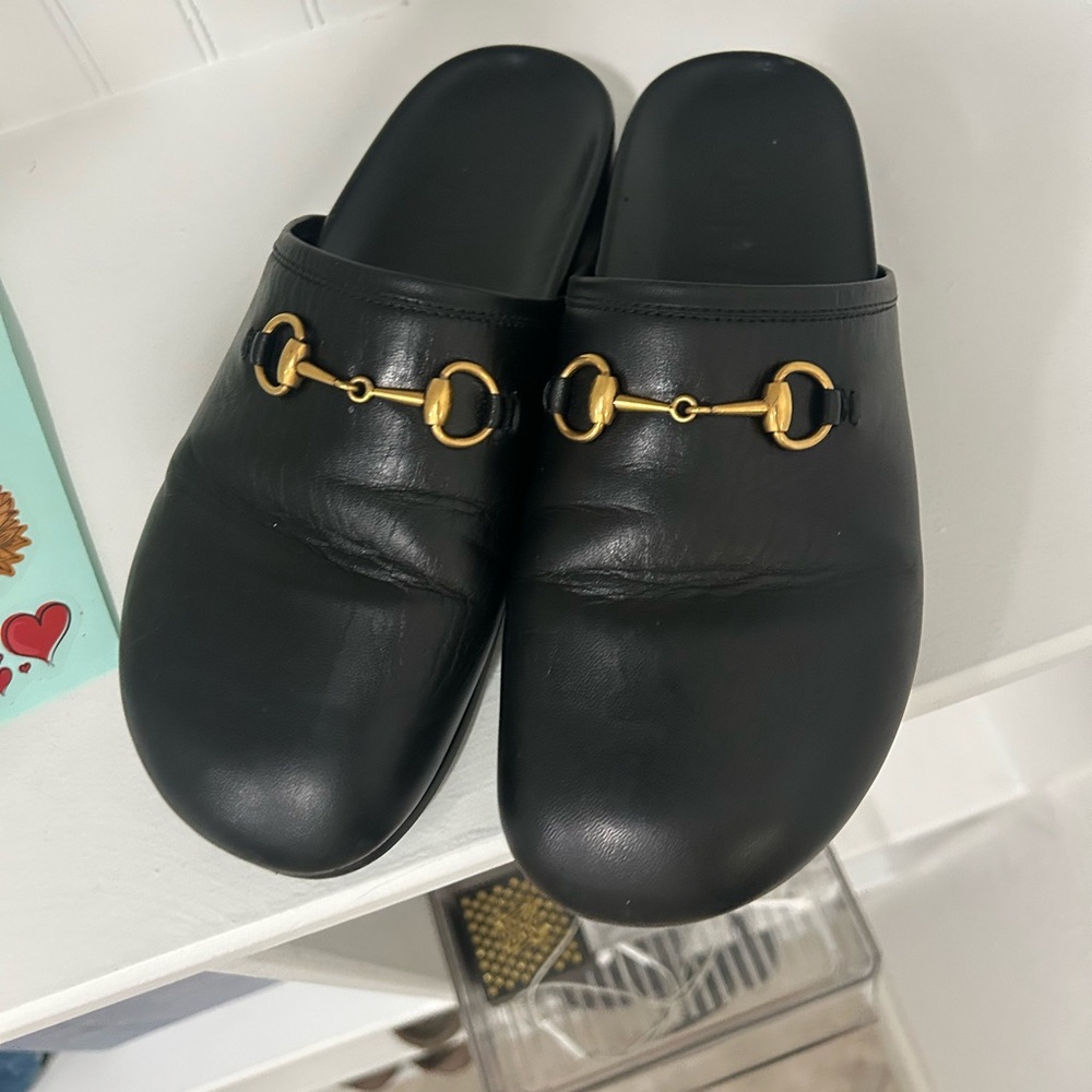 Gucci Black Leather Mules with Gold Detail